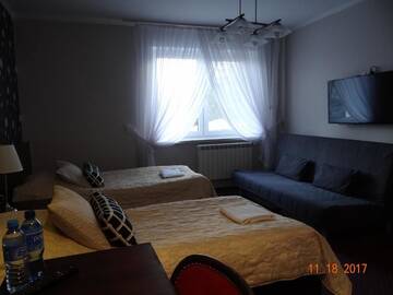 Фото номера Четырехместный номер Отели типа «постель и завтрак» Pensjonat Sala Bankietowa "Arkadia" г. Остроленка 29